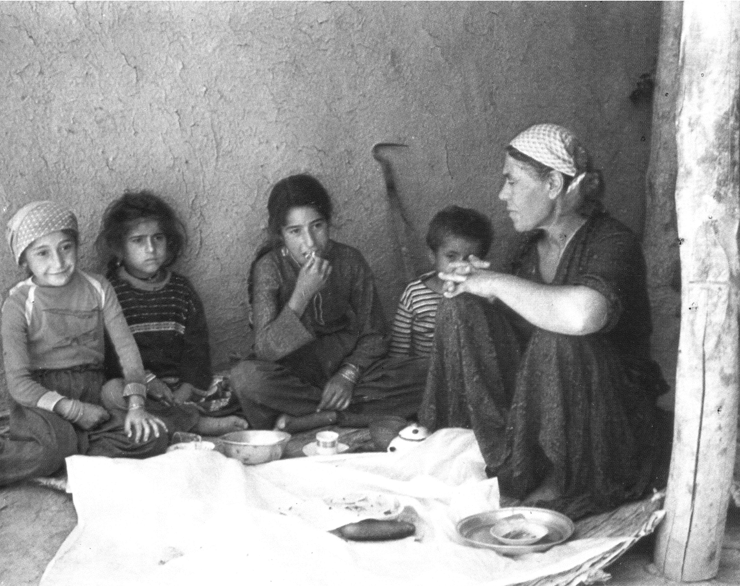 Kurdish children and woman sitting small