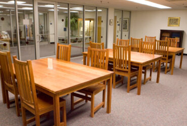 Empty chairs and table in the Huppe Reading Room