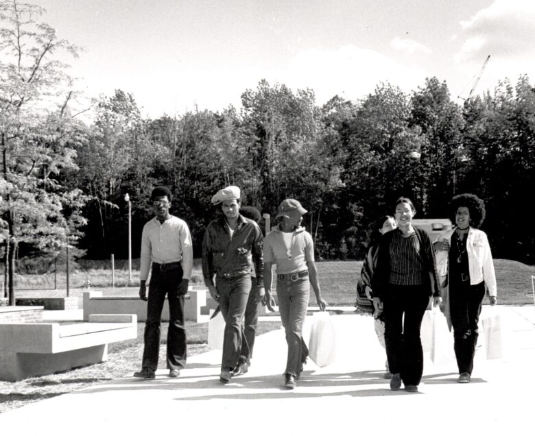 African American Students walk together near College-in-the-Woods on Binghamton University campus in 1971