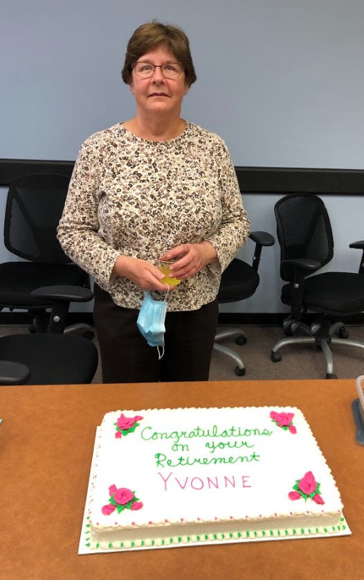 Yvonne Deligato with retirement cake