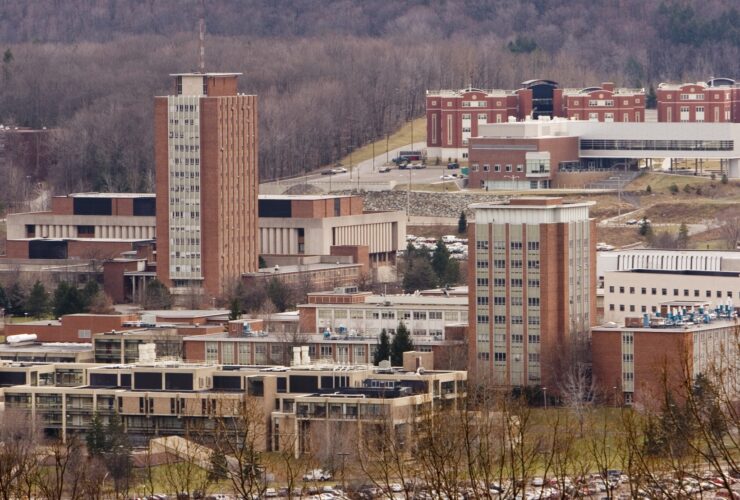 A wide landscape photo of Binghamton University with Bartle Library