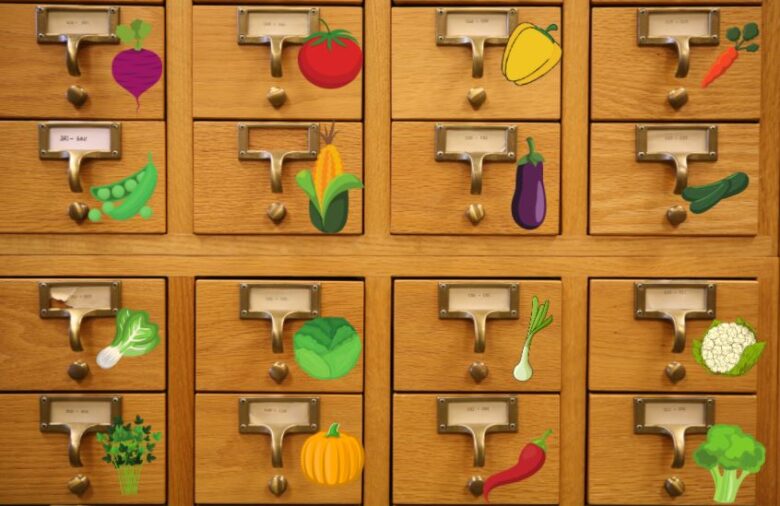 Card catalog with vegetable stickers near the drawer pulls.