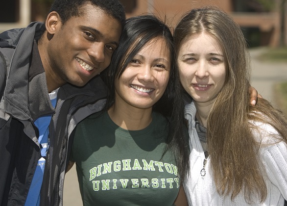 Three Binghamton students with arms around each other