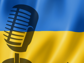 blue and yellow Ukrainian flag behind a recording microphone and soundwaves