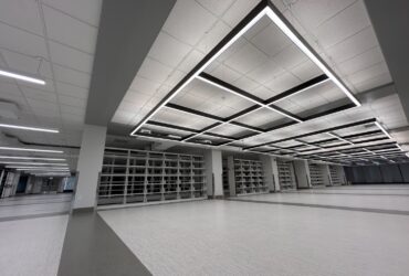 photo of the newly renovated third floor of Bartle Library featuring empty book shelves