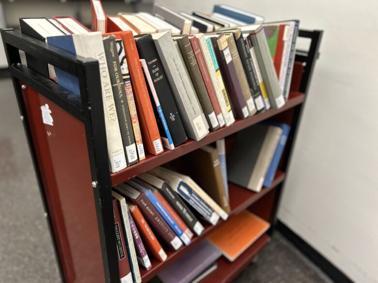 photo of books on a book cart