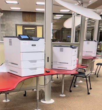 Photo of the color and black-and-white printers available in the Bartle Library Information Commons.