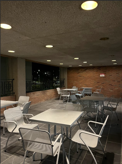 photo of the outdoor patio featuring patio-type tables and chairs.