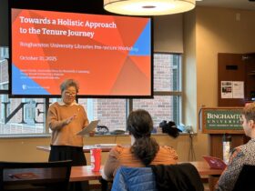 Janet Clarke, associate dean of research and engagement at Stony Brook University Libraries, gives a presentation to pre-tenure library faculty at the Binghamton University Alumni Center.
