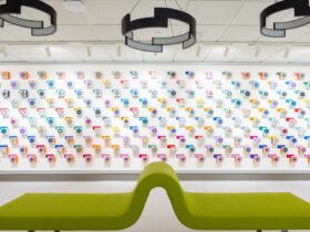 Photo of Art Installation on the Bartle Library 3rd floor Gallery Space featuring 3D blocks with various patterns and colors installed on the wall.