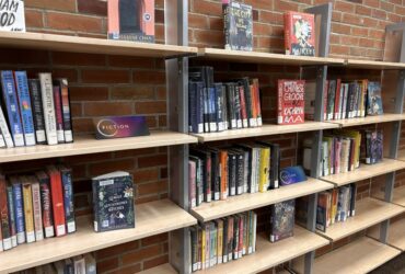 A variety of fiction books on display in The Loft.
