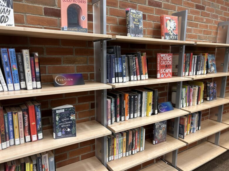A variety of fiction books on display in The Loft.