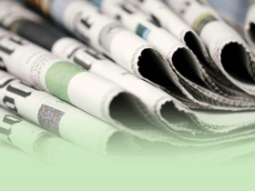 a stack of folded over newspapers